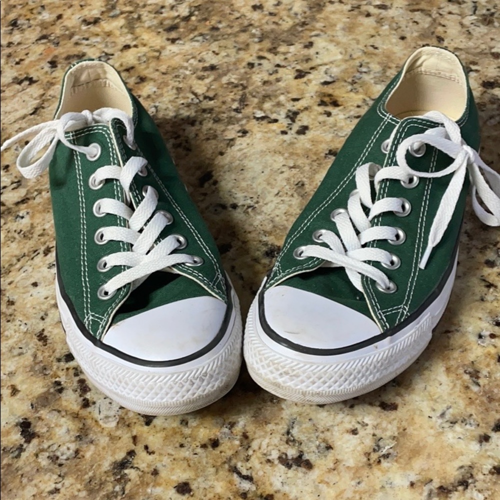Dark green Converse, slightly worn